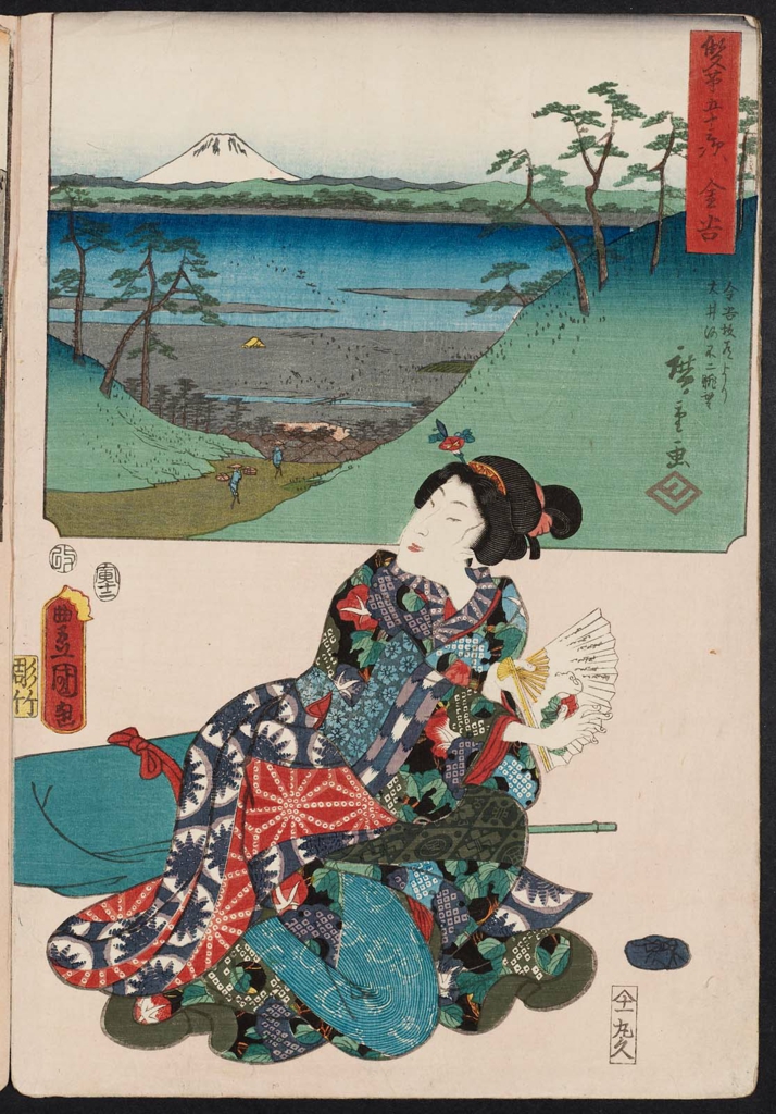 A painting of a woman in traditional Japanese dress. She kneels on the floor and holds a fan. Behind her is a box out of a pastoral scene: two labourers carrying goods walk a path between two hills from the sea.