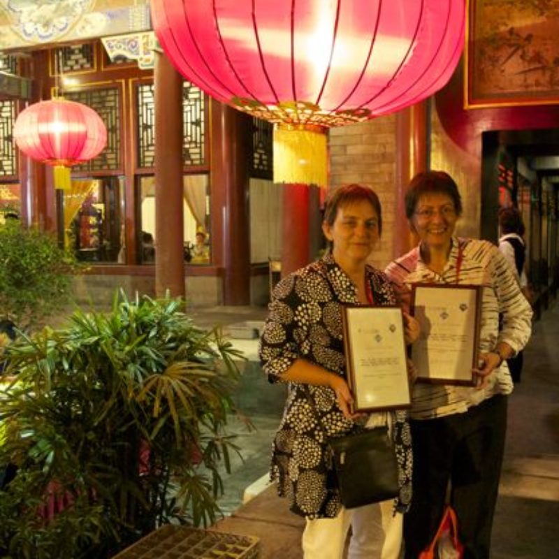 Janet and Yvonne shown holding the award