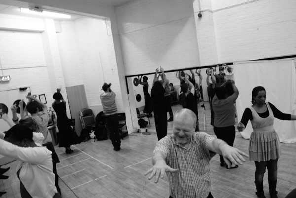 Group face outwards dancing flamenco