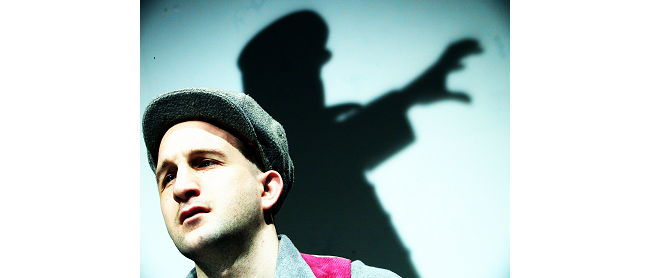 Close up of a young man wearing a cap