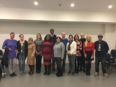 Whole group shot of the Train the Trainer participants with course leaders Tim and Steph