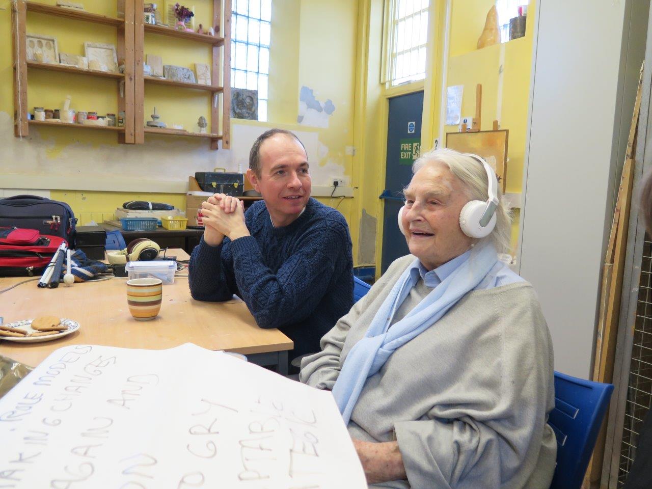 Inter-generational sharing between participants, an elderly woman and younger man