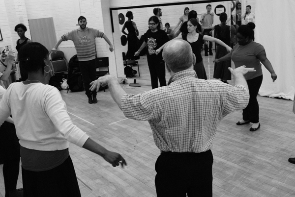 Group in circle dancing flamenco