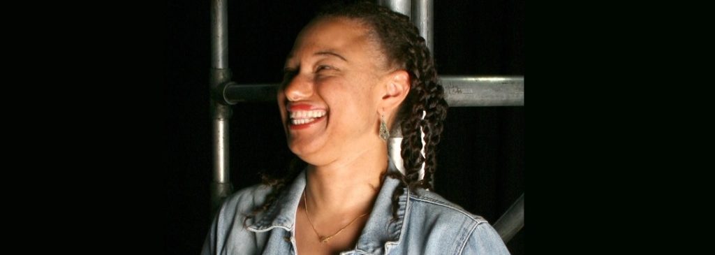 Headshot of Maria Oshodi smiling