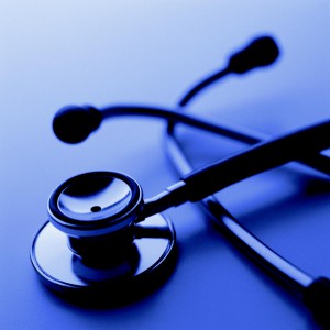 A close up of a stethoscope on a blue background