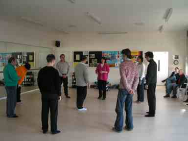 Peter Brooke, seated, right, watches the rehersal of Resistance