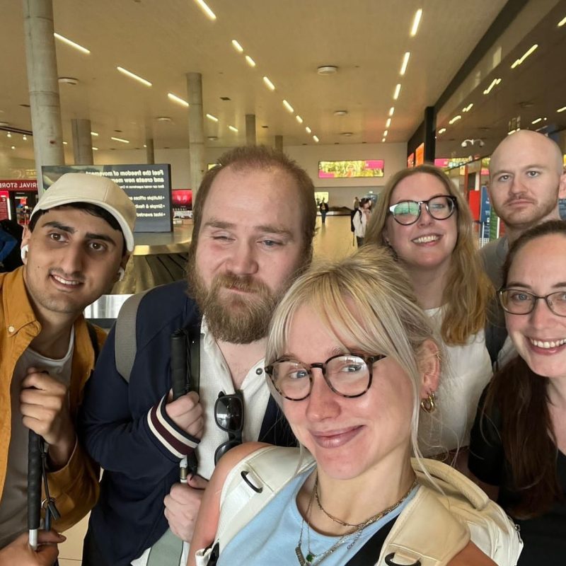 A group from Extant pose smiling for a selfie at Zagreb airport arrivals, from left to right is Aarian Mehrabani, Ben Wilson, Alice Christina-Corrigan, Antonia Beck, Sam Brewer, Louisa Sanfey.