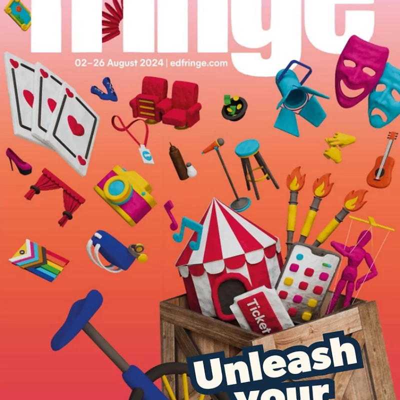 An Edinburgh Fringe Festival poster with a pink palette background. White text is written at the top, which reads 'The Edinburgh Festival' 'Fringe' and '02-26 August 2024. Ed fringe.com.' An explosion of over 28 theatrical icons are emerging out of a wooden box. At the bottom, text which reads 'Unleash your Fringe' and a wooden sign, which reads 'Free'.
