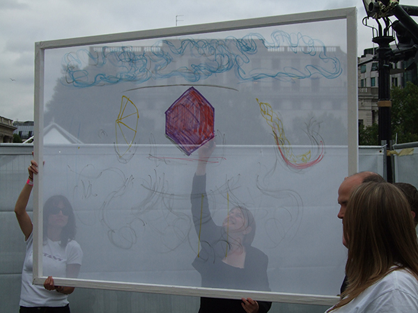 A red hexagon is drawn on Sally's translucent screen